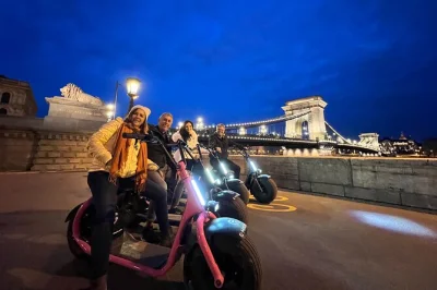 Feel budapest’s night glow from castle hill on a monsteroller e-scooter, guided by locals. includes helmet, all fees, and rain gear if needed. small groups only.