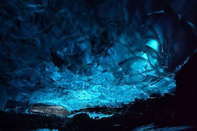 Feel the crunch of glacier ice near jokulsarlon lagoon, explore blue caves with a guide, and ride a super jeep—includes all safety gear and small group size.