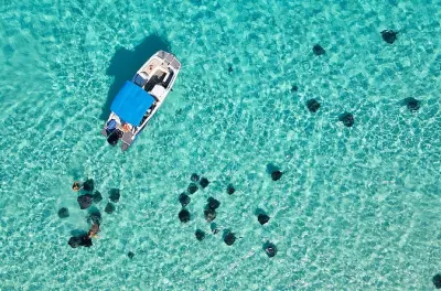 Stingray City al amanecer desde Camana Bay: Privado, 2 horas