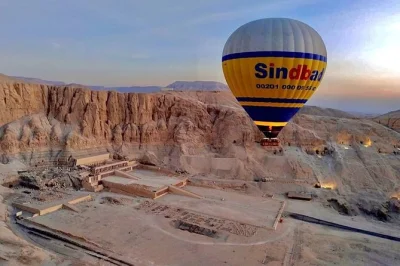 Float above luxor at sunrise in a hot air balloon, see ancient sites from the sky, and end with fresh bananas & egyptian tea on banana island. includes hotel pickup.