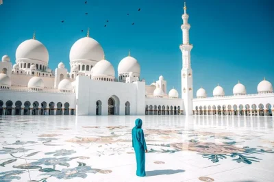 Découvrez la grande mosquée sheikh zayed, le palais qasr al watan et le village du patrimoine à abu dhabi lors d’une excursion d’une journée avec prise en charge depuis dubaï. entrées et pau