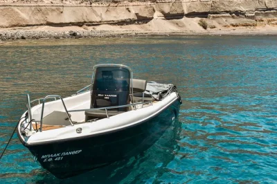 Feel the breeze as you captain your own boat around santorini, thirasia island, and the volcano. includes snacks, bottled water, and easy pickup—no license needed.