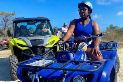 Feel the island breeze on a guided utv & atv tour from philipsburg, exploring both french and dutch sides, swimming at beaches, and feeding iguanas. includes gear & guide.