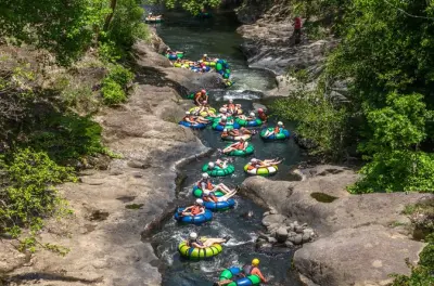 Rio Negro Tubing: Class 2-3 Rapids & Volcanic Mud