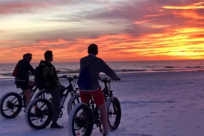 Ride electric bikes along siesta beach at sunset, explore siesta village, and end with a wine & cheese picnic. includes bikes, safety gear, and local guide.