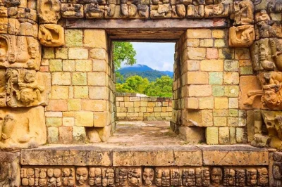 Wake up in copán ruinas, wander ancient mayan temples, taste fruit along the way, and meet macaws up close. includes pickup, hotel, and all entry fees.