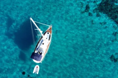 Feel the mediterranean breeze on a private ibiza & formentera sailboat tour, with swimming, snorkeling, paddle surf, and a local captain. includes all equipment.