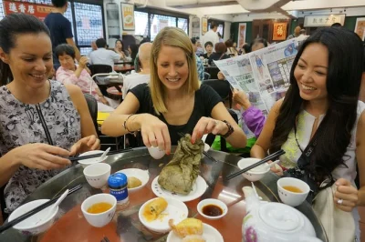 Wander hong kong’s streets on a small-group food tour with a local guide. sample dim sum, milk tea, wonton noodles, and ride the iconic ding ding tram. includes tastings.