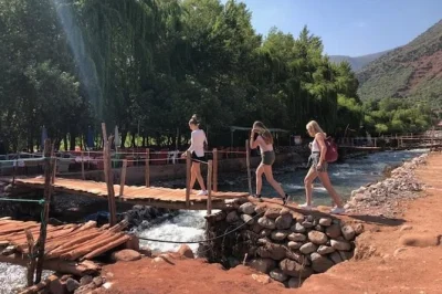 Step out of marrakech for a day trip to the atlas mountains & ourika valley, with berber breakfast by the river, flexible walking, and hotel pickup included.