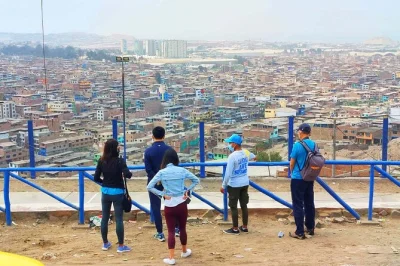 Step into lima’s vibrant shanty towns with a local guide, visit a bustling market, climb the yellow stairs, meet families & enjoy real community moments. includes pickup.