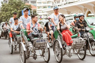 Feel the pulse of saigon on a cyclo ride through flower markets, thien hau temple, and binh tay market—includes hotel pickup and local guide.