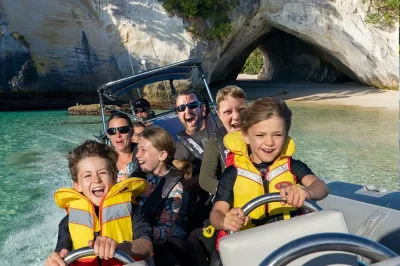 Feel the rush on a cathedral cove boat tour exploring sea caves, blowholes, and the marine reserve with music in orua cave. includes snorkel gear and local guide.