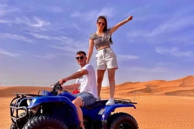 Feel the morning desert wind in dubai with quad biking, camel rides, and sandboarding—includes pickup, local guide, and cold drinks for a real adventure.