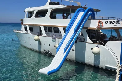 Sail cyprus’ coast from protaras with swim stops at blue lagoon, a huge inflatable slide, local bbq lunch, and live commentary. includes one free drink and wifi.