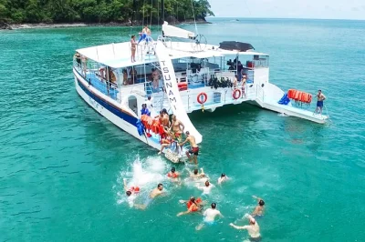 Feel the pacific breeze on a guanacaste catamaran cruise with snorkeling, dolphin spotting, and a wild waterslide. includes lunch, drinks, and all gear.