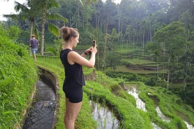 Discover ubud’s rice terraces, ancient temples, and vibrant art market on a private bali tour. includes hotel pickup, entrance fees, and local guide. book now.