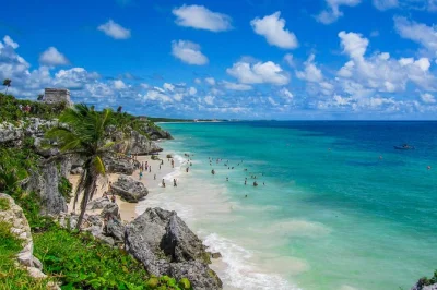 Scopri le rovine maya di coba e tulum, nuota in un cenote e passeggia sulla quinta avenida di playa del carmen—ritiro in hotel, pranzo e guida inclusi per una giornata completa nella riviera maya.