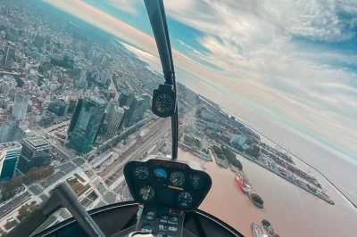 Feel the city buzz below on a private helicopter flight over buenos aires, with views of the obelisk, recoleta cemetery, and puerto madero. includes heliport transfer.