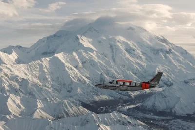 Feel the rush of flying close to denali’s summit, circling glaciers and ridges on a narrated flightseeing tour. includes hotel pickup, window seats, and local pilots.