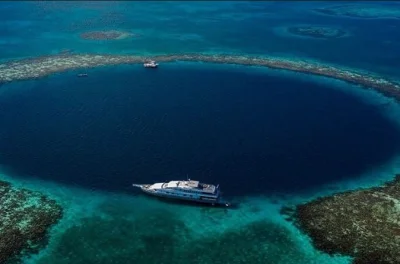Descubra o sinai em um dia: snorkel no blue hole, passeio de jeep pelo colored canyon, cavalgada de camelo à beira-mar e almoço típico em dahab.