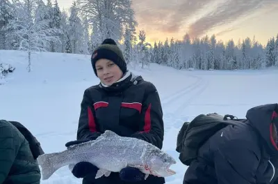 Ice fishing in Lapland: Private pond with trout soup