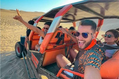 Descubre la fauna de las islas ballestas, el oasis de huacachina, paseos en buggy por las dunas y sandboard en una excursión guiada desde lima. recogida en hotel incluida.