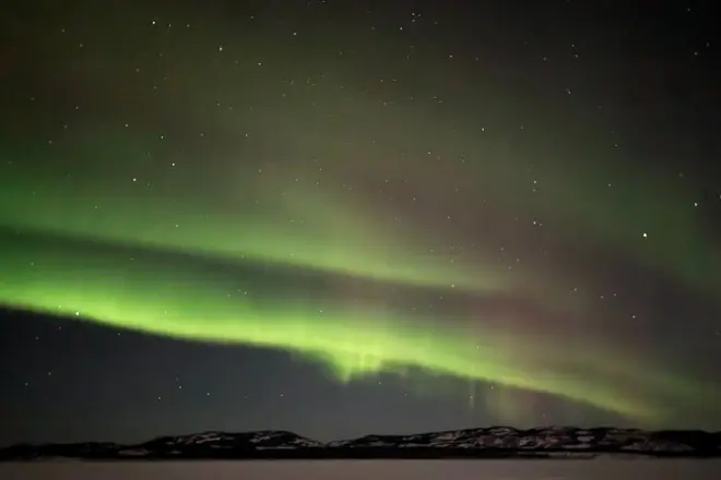 À Whitehorse, pêche sur glace et aurores dans un abri chauffé