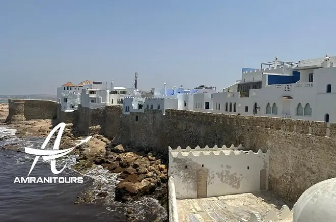 Private Day Trip to Asilah and Hercules Caves: Africa-shaped cave entrance