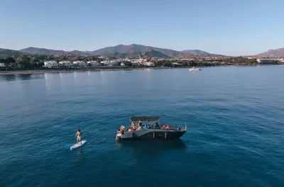 2-Hour Private Boat Charter Estepona: Dolphins & Paddle Board