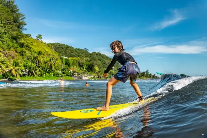 Surfing Lesson in Tahiti: Learn on Black Sand Beaches