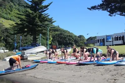 Avventura stand up paddle board a Mount Maunganui con guide Māori