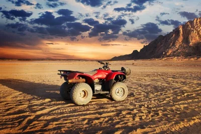 Sinta o vento do deserto do sinai em um quadriciclo, visite a montanha do eco e tome chá beduíno em sharm el sheikh. inclui transporte, guia e opção de passeio de camelo.