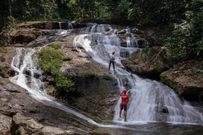 Zipline through belize’s jungle, hike to bocawina falls, rappel down the waterfall, and swim in rainforest pools. family-friendly adventure tour with guides.