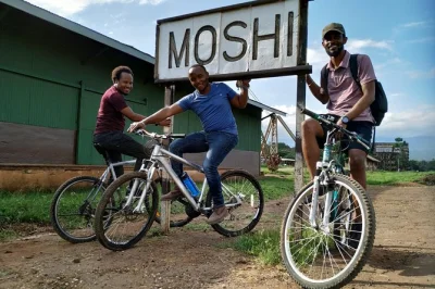 Cycle moshi’s lively streets, visit local markets, see the clock tower, and catch kilimanjaro views on this guided city bike day trip. easy level, all welcome.