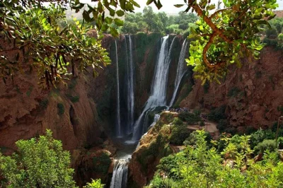 Feel the spray at ouzoud waterfalls, spot wild monkeys, share lunch above the falls, and trek with a local guide. includes hotel pickup and boat ride.