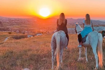 Feel the wind and colors of cappadocia on a sunset horseback ride through rose and red valleys, with hotel pickup and a friendly local guide included.