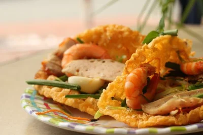 Follow a local guide through hue’s best street food stalls, taste real flavors, stroll the citadel, and wander dong ba market—includes pickup and all tastings.