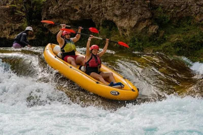 Feel the rush of zrmanja river kayaking near zadar, paddle clear rapids, swim beneath waterfalls, and share laughs with a local guide. includes all equipment.