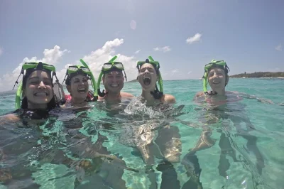 Feel the sand on icacos island, snorkel with a local guide, hike hidden trails, and relax under your own umbrella. includes water taxi, drinks, and gear.