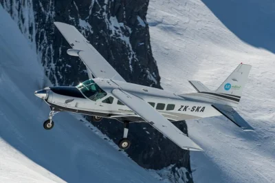 Feel the rush of flying over fiordland’s peaks, cruise milford sound’s wild waters, and enjoy a local lunch—includes hotel pickup and live commentary.