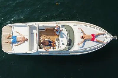 Private Lake Como boat tour from Argegno: Villas, swim & wine