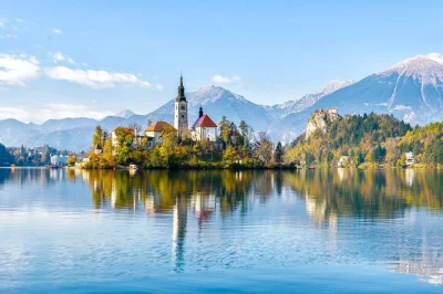 Feel the quiet magic of lake bled with a castle visit, pletna boat ride to the island, and local guide. includes hotel pickup and all transport from ljubljana.