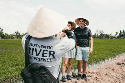 Step into the mekong delta from ho chi minh city with a day trip by speedboat, riverside market strolls, rowboat canals, and lunch at a local family’s house. includes pickup.