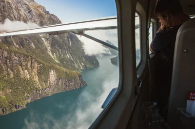 Soar over fiordland’s peaks, cruise milford sound’s wild waters, and fly a different route back to queenstown. includes hotel pickup, window seats, and light lunch.