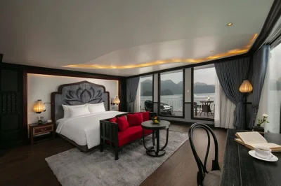 Wake up to lan ha bay’s quiet waters, kayak past floating villages, try your hand at a cooking class, and unwind with sunset drinks. includes pickup from hanoi.