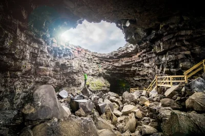 Step into iceland’s víðgelmir lava cave on a guided walkway tour. see wild rock colors, hear stories from local guides, and explore safely with helmet included.