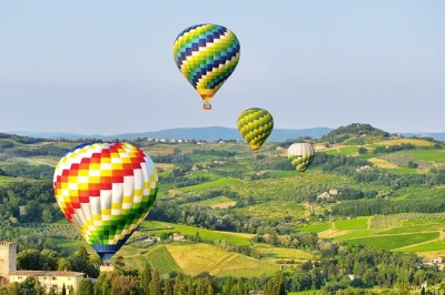 Float above tuscany’s hills, vineyards, and castles on a hot air balloon ride from san casciano. includes safety briefing, local crew, and champagne toast after landing.