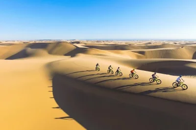 Feel the sand shift beneath your wheels on a swakopmund fat bike tour, cycling the namib dunes with a local guide. includes helmet, bike, and all gear.