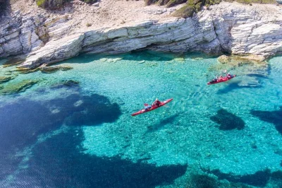 Feel the ionian breeze as you kayak lefkada’s blue cave, snorkel in clear waters, and share a local snack—includes all gear and a guide for easy booking.