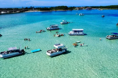 Disfruta de la brisa del golfo en un tour de 3 horas en destin—explora la barra de arena de crab island, prueba paddle board, avista delfines en el puerto y relájate sobre lilypad mats. incluye agu